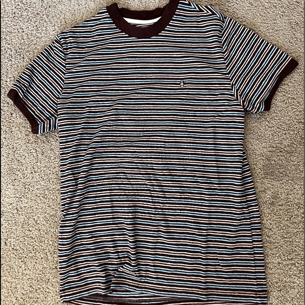 Striped original penguin shirt.